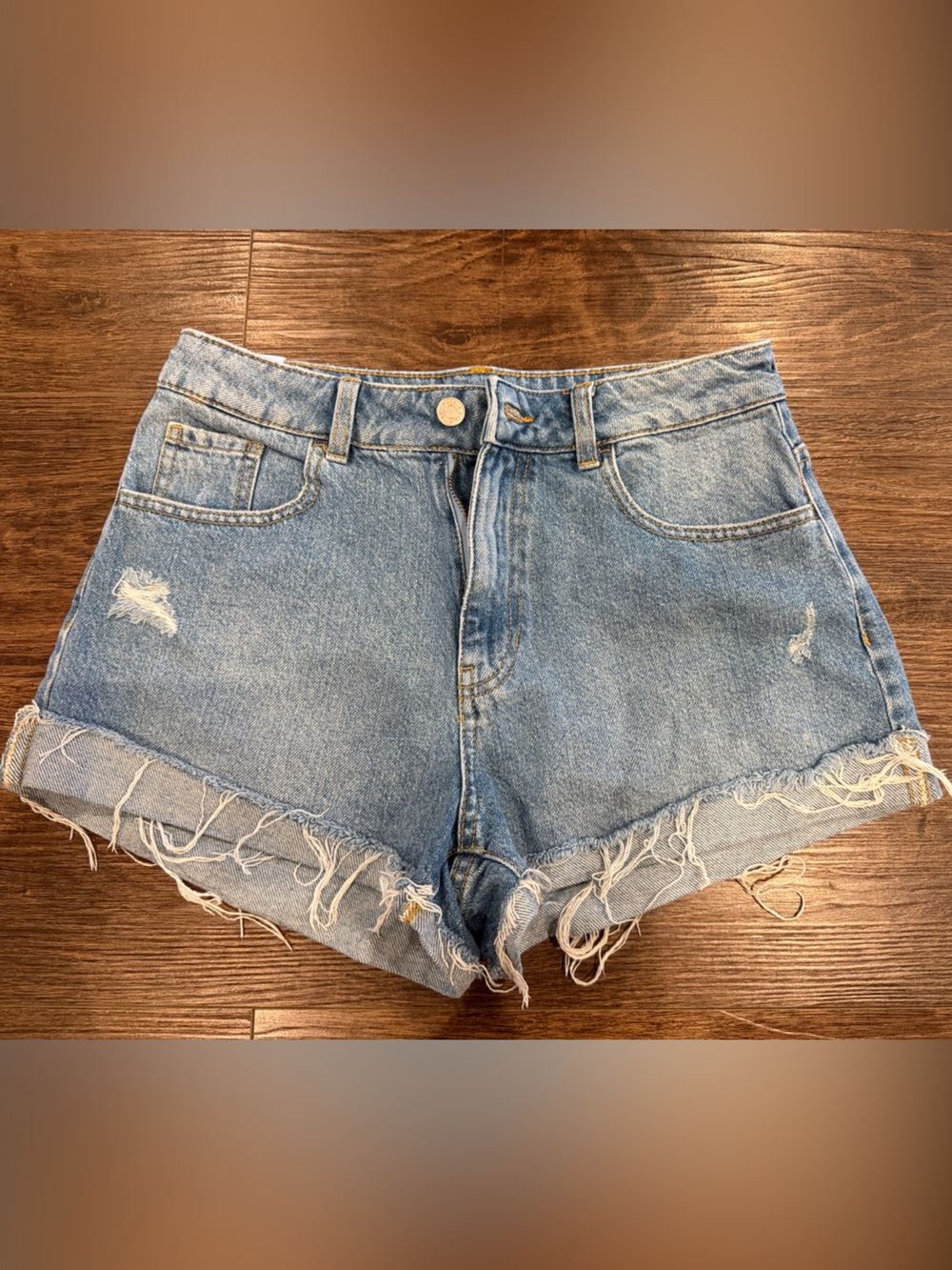 Women’s Light Blue Distressed Denim Shorts